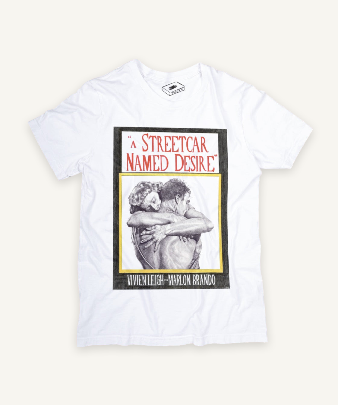 a streetcar named desire T-shirt on ivory background with natural shadow