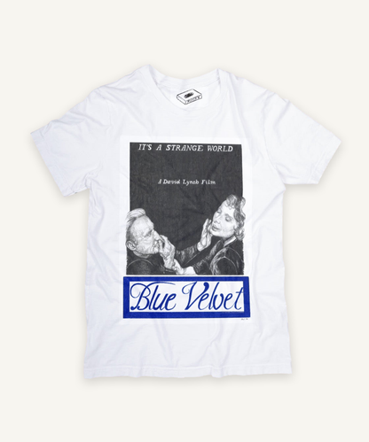 blue velvet T-shirt on ivory background with natural shadow