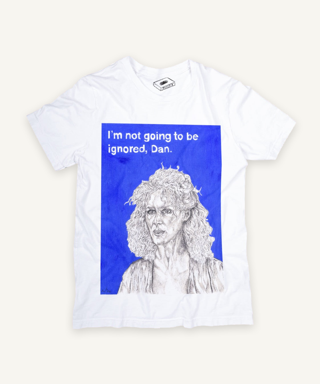 fatal attraction T-shirt on ivory background with natural shadow