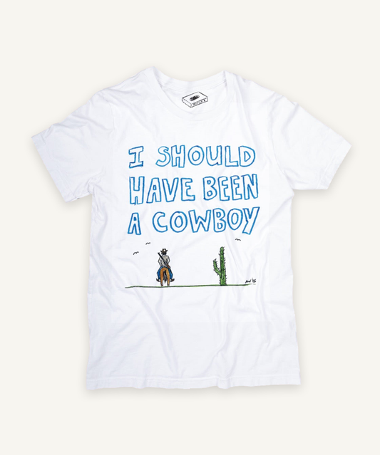 i should have been a cowboy T-shirt on ivory background with natural shadow