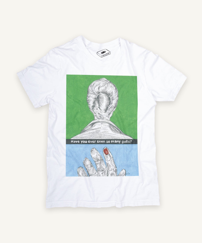 the birds T-shirt on ivory background with natural shadow