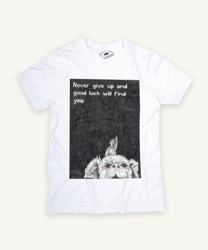 the never ending story T-shirt on ivory background with natural shadow