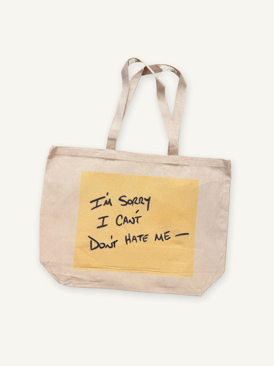 Sex & the City tote bag with natural canvas color on an ivory background